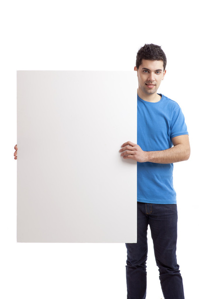 Man holding a blank billboard - Foto, afbeelding