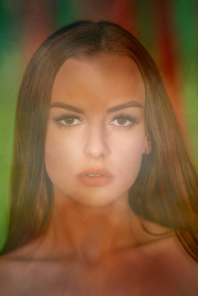 Portrait of a young beautiful woman Surreal blurry portrait - 写真・画像