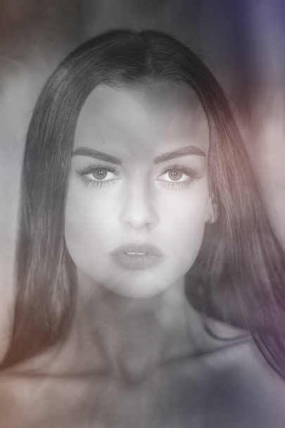 Portrait of a young beautiful woman Surreal blurry portrait - 写真・画像