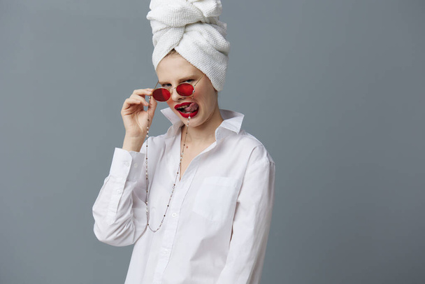 woman red glasses towel on head makeup studio model unaltered - Φωτογραφία, εικόνα