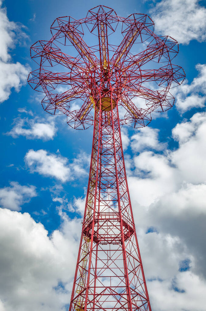 Coney Island Parachute Jump view from low angle during daylight with clouds in background, New York City NYC, USA - Φωτογραφία, εικόνα