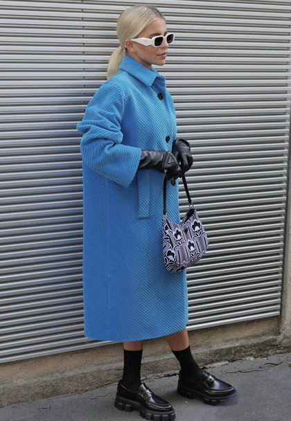 Fashion blogger, guests and model street style outfit before Prada fashion show during Milano fashion week 2021/2022 - Foto, imagen