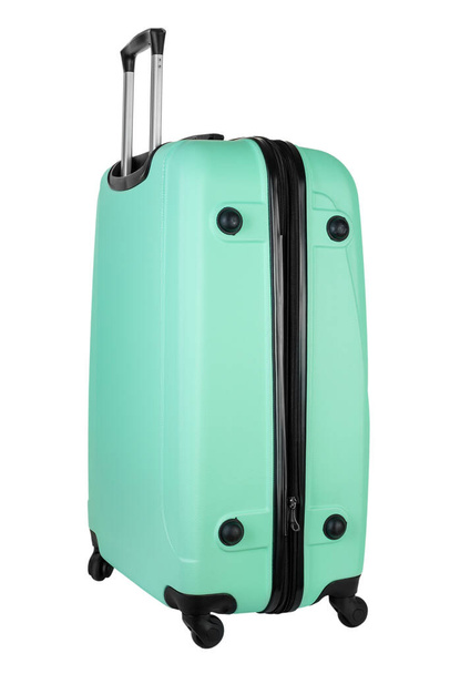 Travel turquoise suitcase isolated on white background. Summer holidays, tourism, vacation. File contains clipping path. - 写真・画像