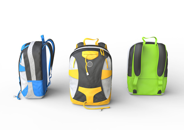 Blue, yellow and green backpacks on white background - Photo, Image