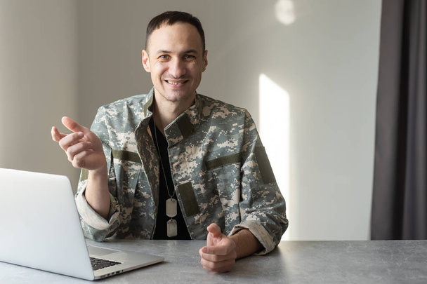 military man using laptop with blank screen - Foto, Imagen