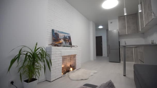 Stylish interior of room with fireplace - Footage, Video