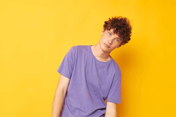 red haired guy summer posing style fashion yellow background - Foto, afbeelding