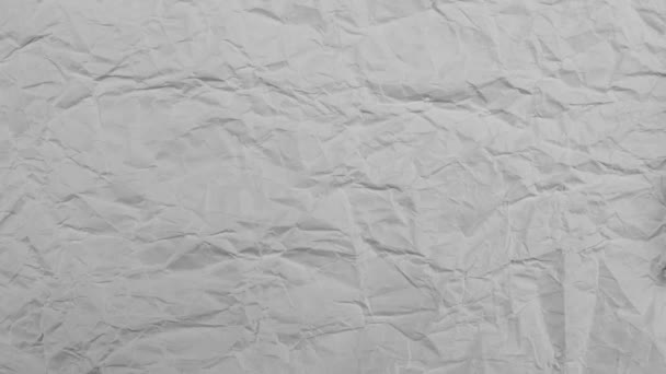 Stop beweging lussen animatie van witte gerimpelde papier textuur achtergrond. Creatief concept voor tekst en bijschrift. Blanco leeg vel papier. Ruimte voor tekst. Naadloos lussen. - Video