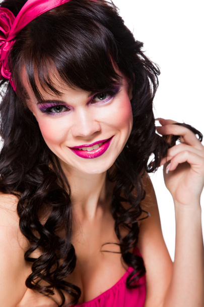 Portrait of beautiful girl with dark hair wearing pink on white - Fotografie, Obrázek