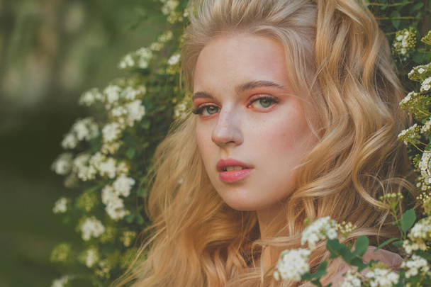 Close up portrait of beauty young woman with blonde hair enjoying nature outdoors - Photo, Image