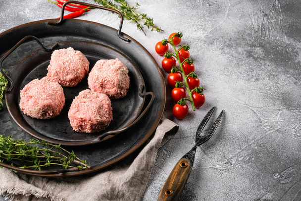 Fresh raw turkey meatballs set, on gray stone table background, with copy space for text - Fotoğraf, Görsel