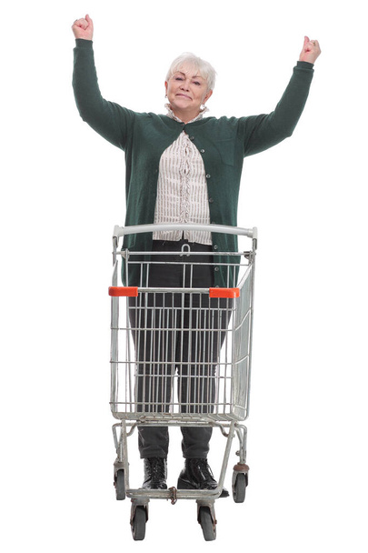 Elegantní oblečené a šťastně vypadající starší žena na její cestě na nákupy - Fotografie, Obrázek
