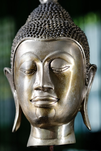 Pronssi buddha pää. lähikuva
 - Valokuva, kuva
