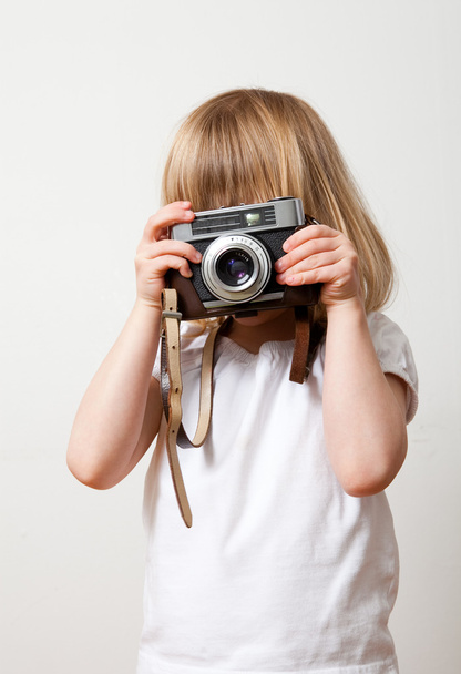 Little girl with camera - Photo, image