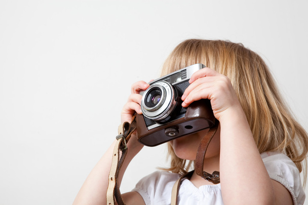 Little girl with camera - Фото, зображення