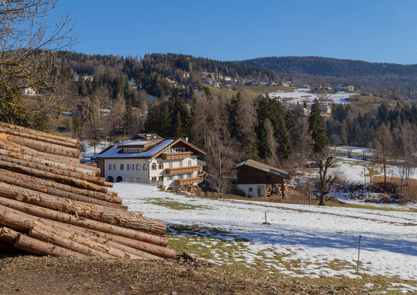 Rural scenery around a village named St Felix in South Tyrol at winter time - Photo, Image