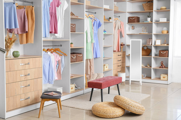 Interior of walk-in closet with stylish clothes - Photo, Image