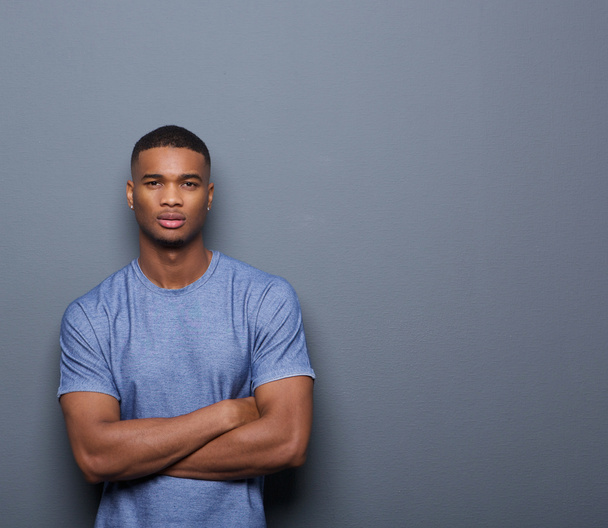 Handsome african american man posing with arms crossed - Photo, Image