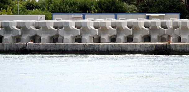 very big concrete blocks to build a large dam in the sea - Photo, Image