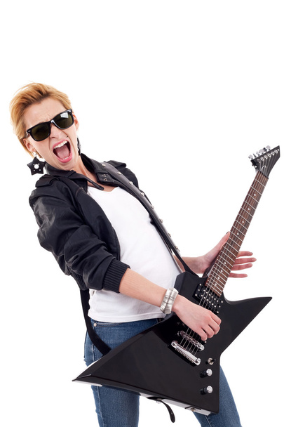Woman screaming while playing an electric guitar - Photo, Image