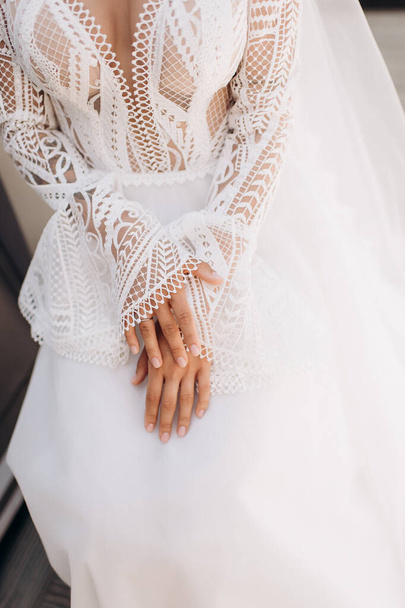 gentle touches of the bride's hand close-up - Foto, Imagem