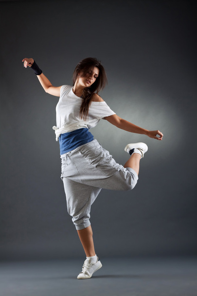 Young modern style dancer is posing - Фото, зображення