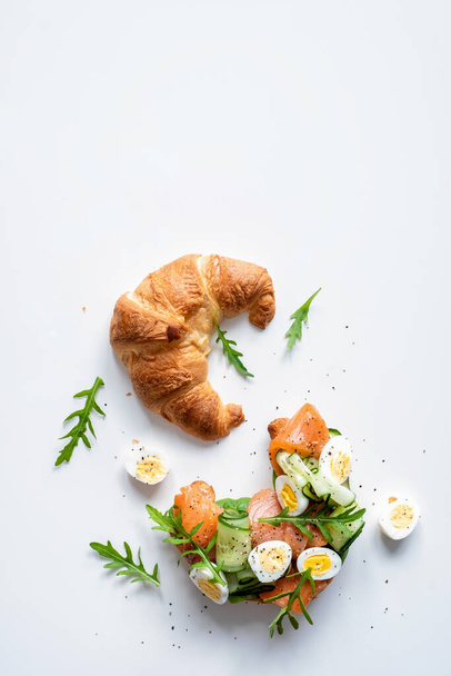 Croissant Sandwich with cucumber and salmon - Foto, imagen