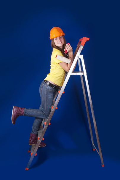 Girl with paint rollers on stepladder - Fotografie, Obrázek
