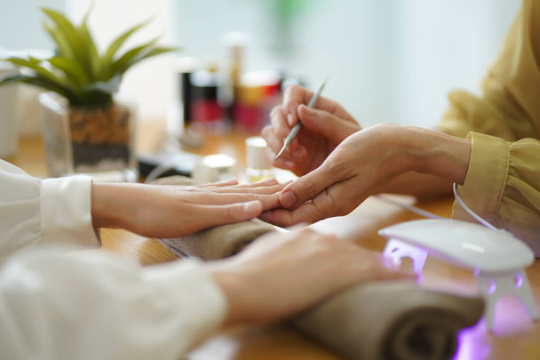 hands close up woman making manicure - Foto, Imagen