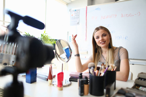 Woman blogger conducts makeup training remotely closeup - Photo, image