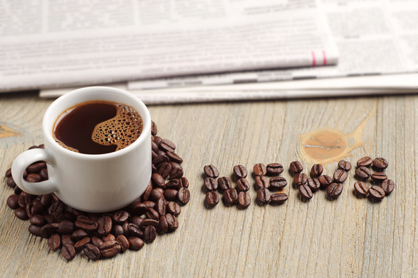 Coffee, newspaper and the word news - Photo, Image