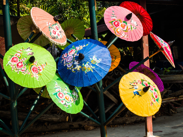 Colorful rice paper umbrella dried in nature. - Photo, Image