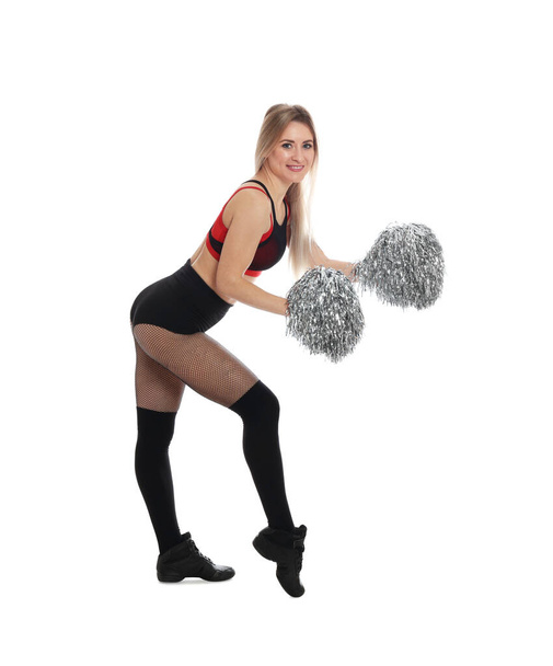 Beautiful cheerleader in costume holding pom poms on white background - Foto, afbeelding
