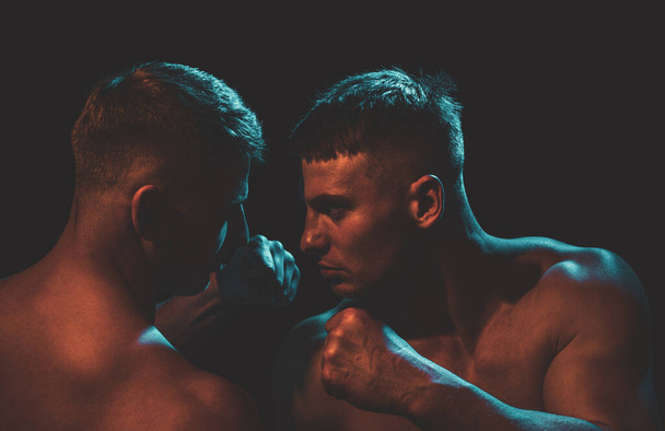 Two aggressive men. Violent concept. Guys fight. Angry male. Strong and power mans hand with muscles. - Fotoğraf, Görsel