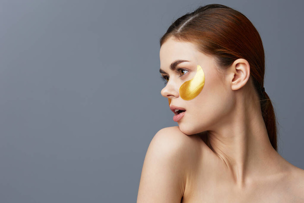 portrait woman skin care face patches bare shoulders close-up Lifestyle - Photo, Image