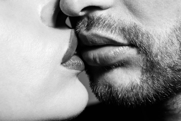 Kissing couple in love. Cropped macro of kisses face, close-up. - Foto, imagen