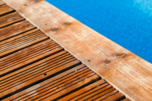 swimming pool with treated wood damaged - Fotografie, Obrázek