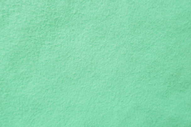 Felt pastel green soft rough textile material background texture close up,poker table,tennis ball,table cloth. Empty green  fabric background..	 - Foto, afbeelding
