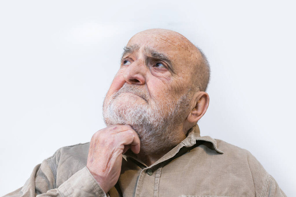 old man thinking isolated on white background - Zdjęcie, obraz