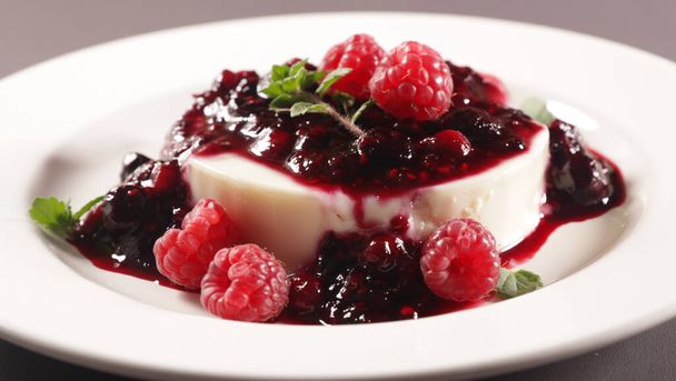 panna cotta with berries fruits syrup - Фото, изображение