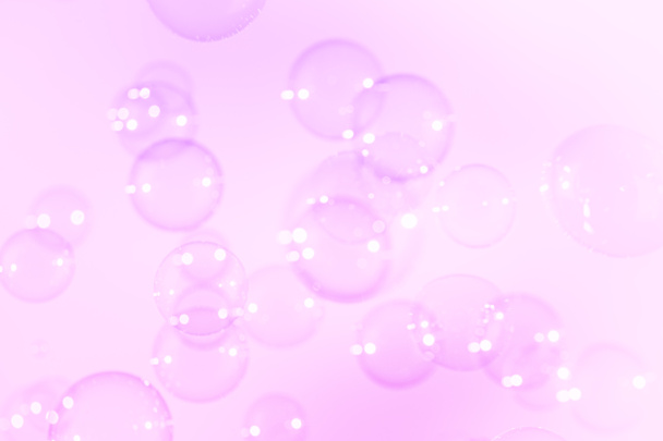 Gyönyörű átlátszó rózsaszín szappan buborékok háttér - Fotó, kép