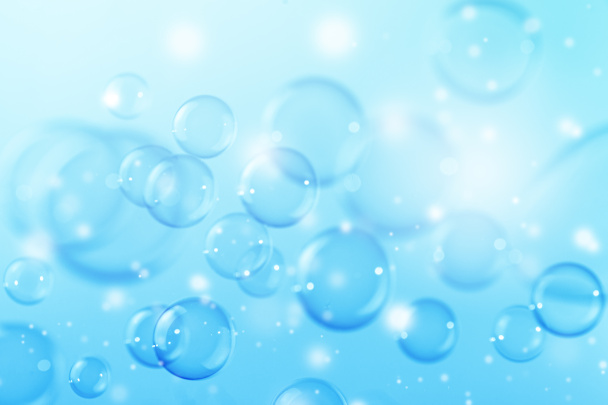 Krásné průhledné lesklé modré mýdlo bubliny na pozadí. Oslava, Bokeh Bubbles Backdrop. Vánoční tapeta. - Fotografie, Obrázek