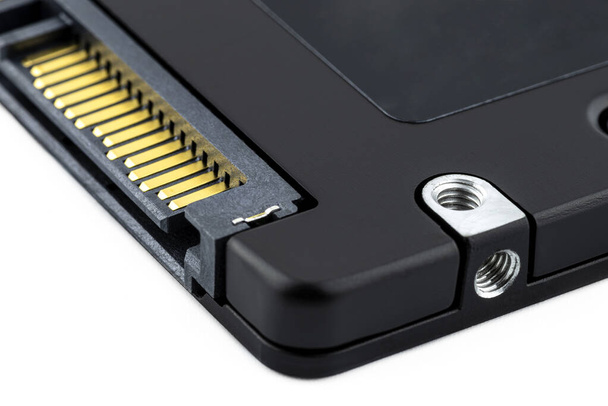 Macro shots of the SATA connector and the power connector on the solid-state drive, visible screw fixing. - Zdjęcie, obraz