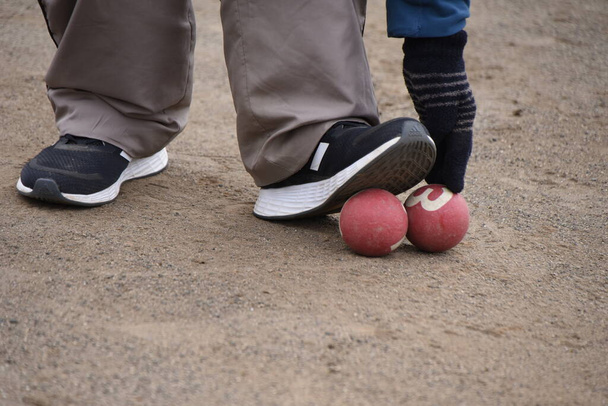 El Gateball es un deporte que se originó en Japón y es muy popular entre los ancianos. Se basa en croquet y se juega entre dos equipos, cada uno formado por cinco miembros. - Foto, Imagen