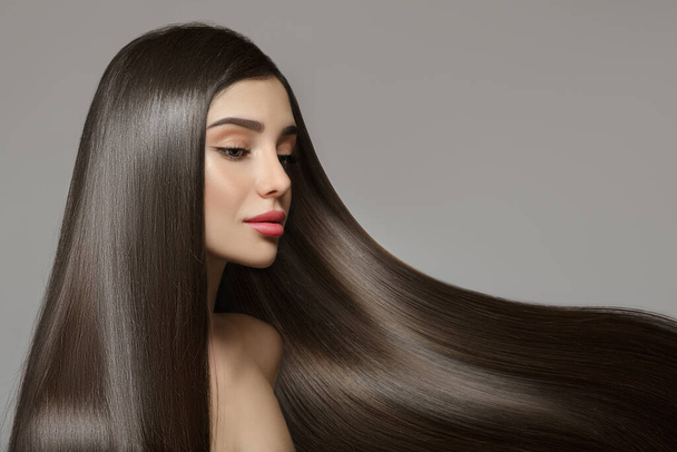 Fashion woman with straight long shiny hair. Beauty and hair care - Photo, Image