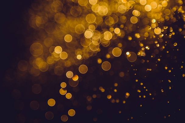 Luxury abstract golden bokeh use for background - Foto, imagen