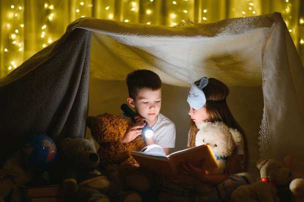 Little children reading bedtime story at home - Photo, Image