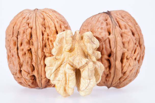 Some walnuts isolated on white background - Photo, Image