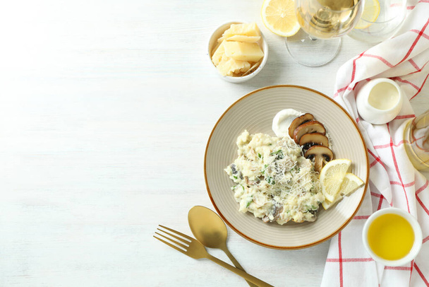 Concept of tasty food with risotto with mushrooms, space for text - Φωτογραφία, εικόνα