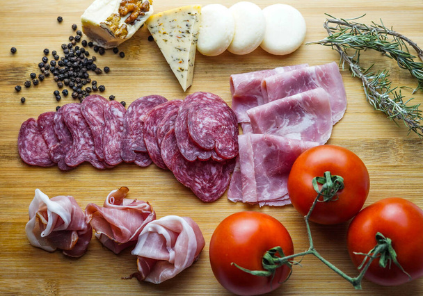 Rustic table of Iberian sausages and cheeses - Foto, Imagem